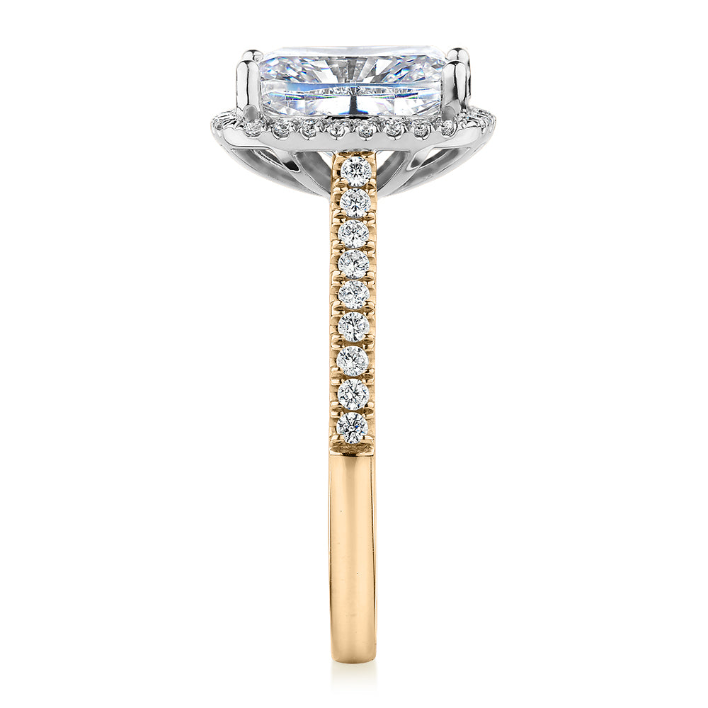 Cushion Radiant and Round Brilliant halo engagement ring with 3.73 carats* of diamond simulants in 10 carat yellow and white gold
