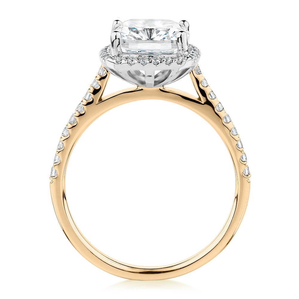 Cushion Radiant and Round Brilliant halo engagement ring with 3.73 carats* of diamond simulants in 10 carat yellow and white gold