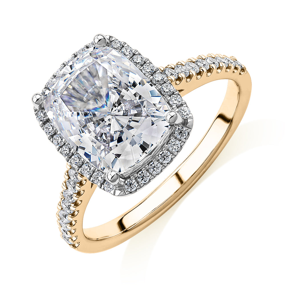 Cushion Radiant and Round Brilliant halo engagement ring with 3.73 carats* of diamond simulants in 10 carat yellow and white gold