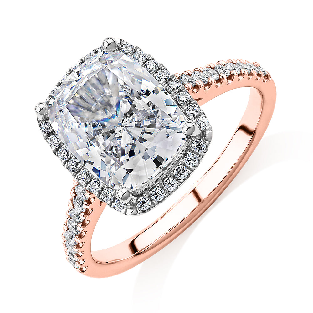 Cushion Radiant and Round Brilliant halo engagement ring with 3.73 carats* of diamond simulants in 10 carat rose and white gold