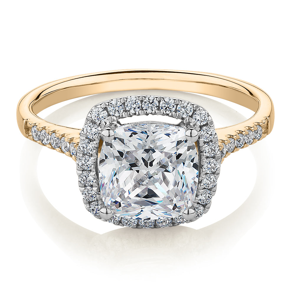Cushion and Round Brilliant halo engagement ring with 1.91 carats* of diamond simulants in 14 carat yellow and white gold
