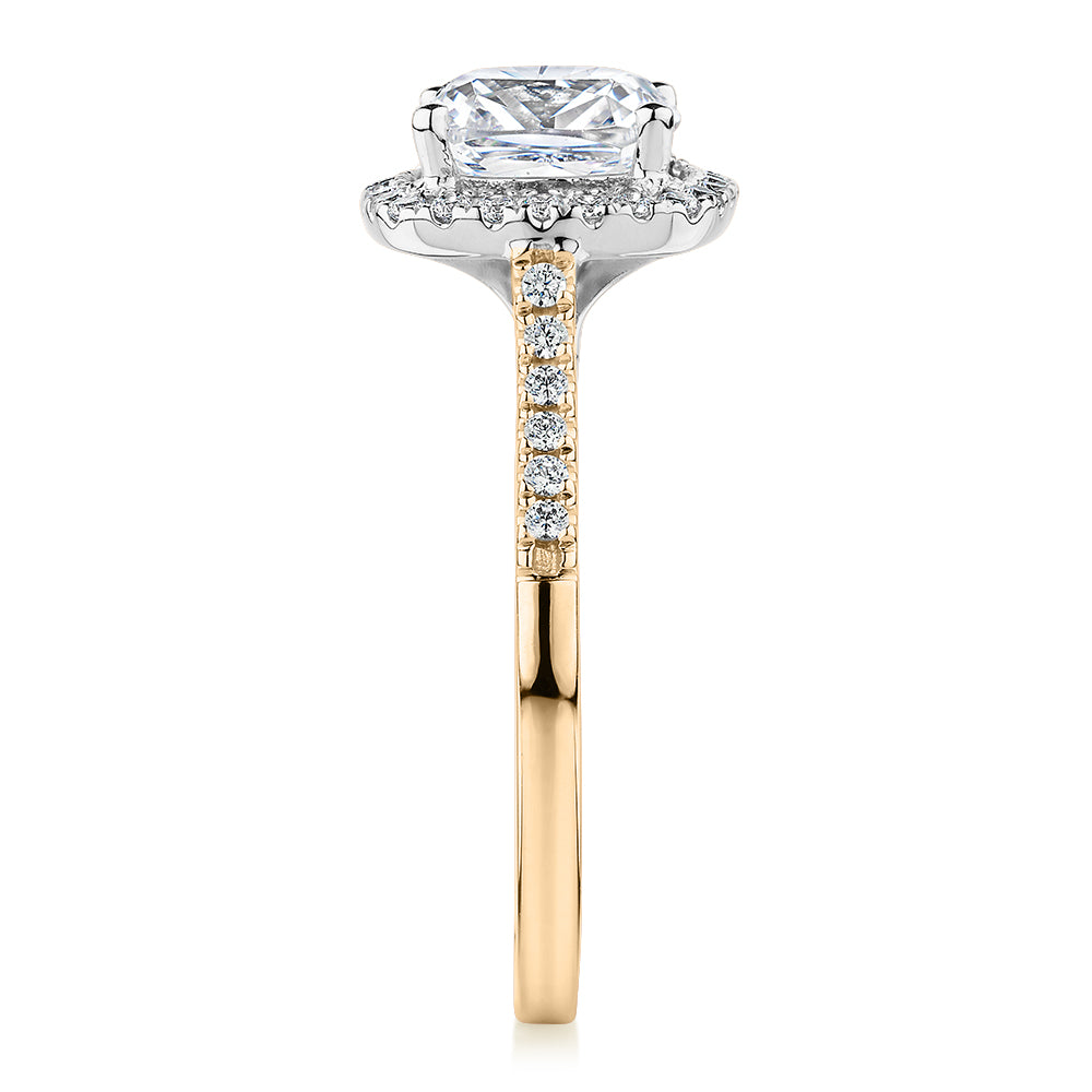 Cushion and Round Brilliant halo engagement ring with 1.91 carats* of diamond simulants in 14 carat yellow and white gold