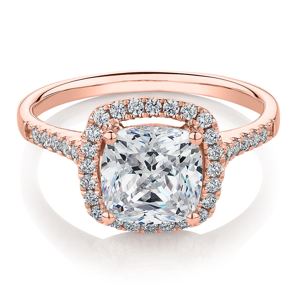 Cushion and Round Brilliant halo engagement ring with 1.91 carats* of diamond simulants in 14 carat rose gold