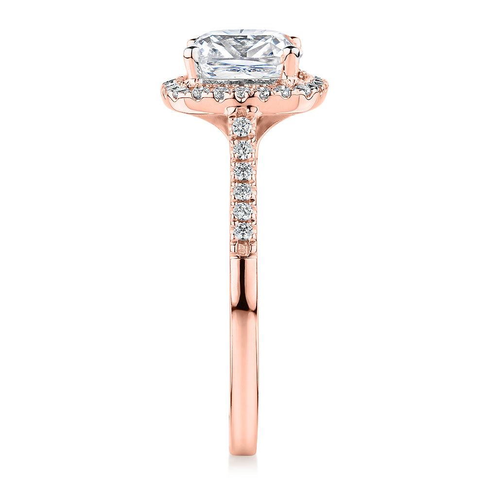 Cushion and Round Brilliant halo engagement ring with 1.91 carats* of diamond simulants in 14 carat rose gold