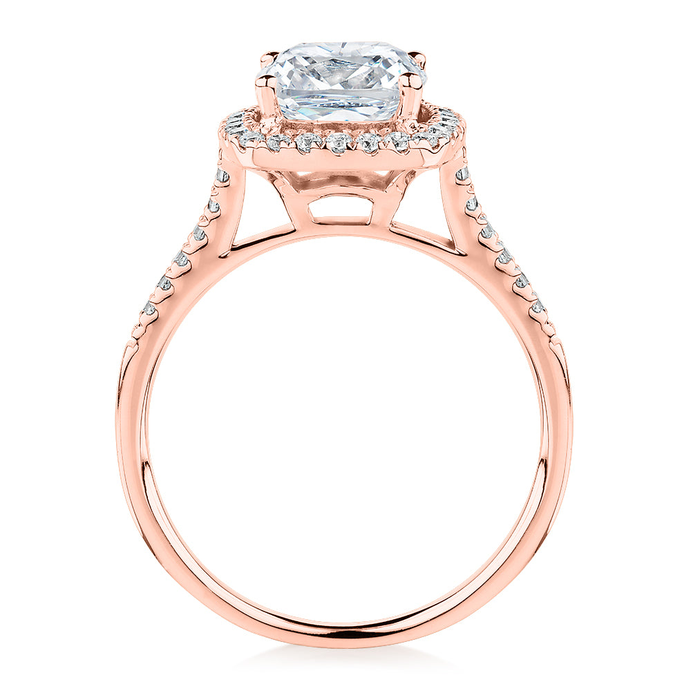 Cushion and Round Brilliant halo engagement ring with 1.91 carats* of diamond simulants in 14 carat rose gold