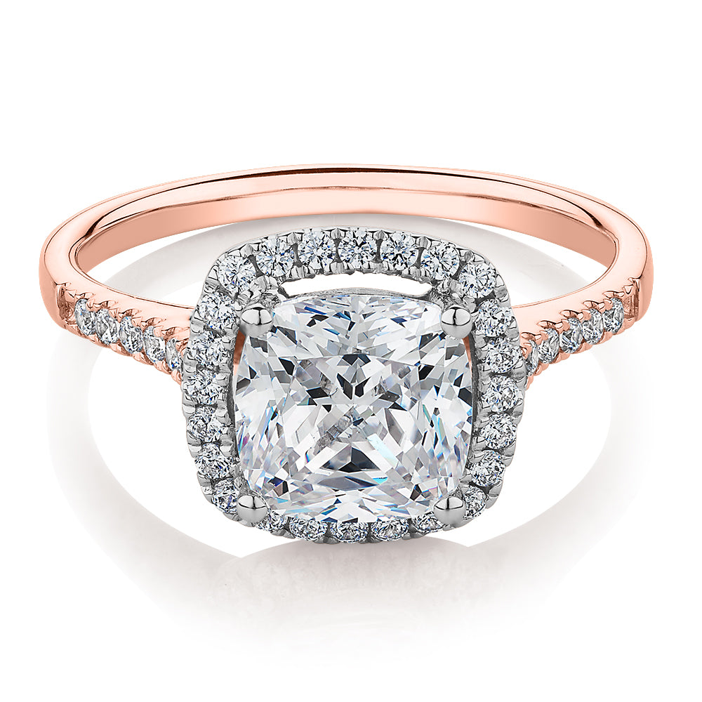 Cushion and Round Brilliant halo engagement ring with 1.91 carats* of diamond simulants in 14 carat rose and white gold
