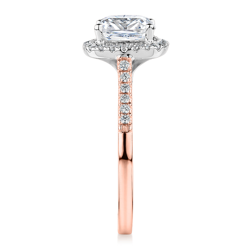 Cushion and Round Brilliant halo engagement ring with 1.91 carats* of diamond simulants in 14 carat rose and white gold