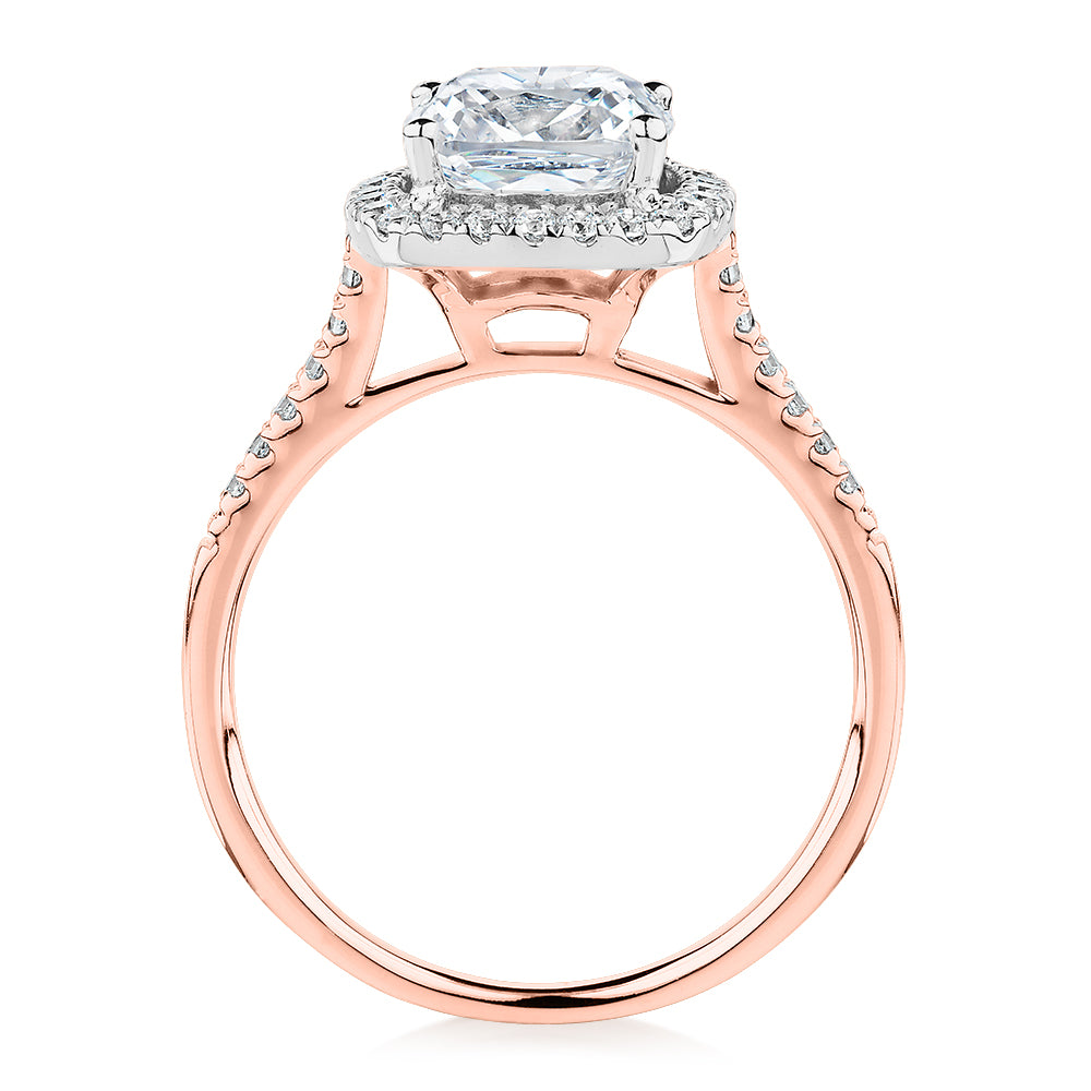 Cushion and Round Brilliant halo engagement ring with 1.91 carats* of diamond simulants in 14 carat rose and white gold