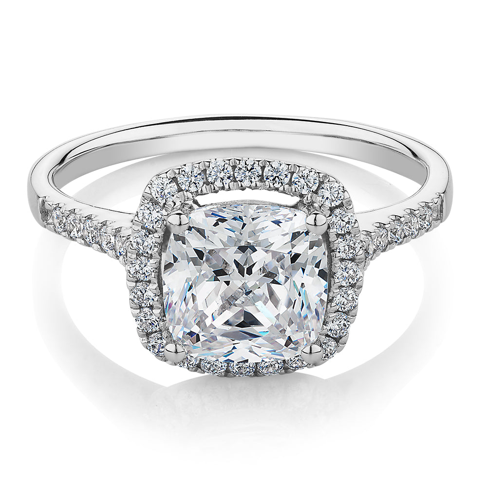 Cushion and Round Brilliant halo engagement ring with 1.91 carats* of diamond simulants in 14 carat white gold