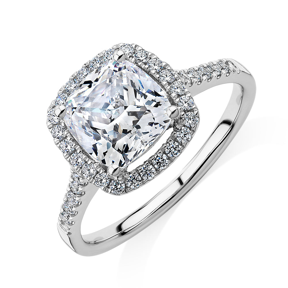 Cushion and Round Brilliant halo engagement ring with 1.91 carats* of diamond simulants in 14 carat white gold