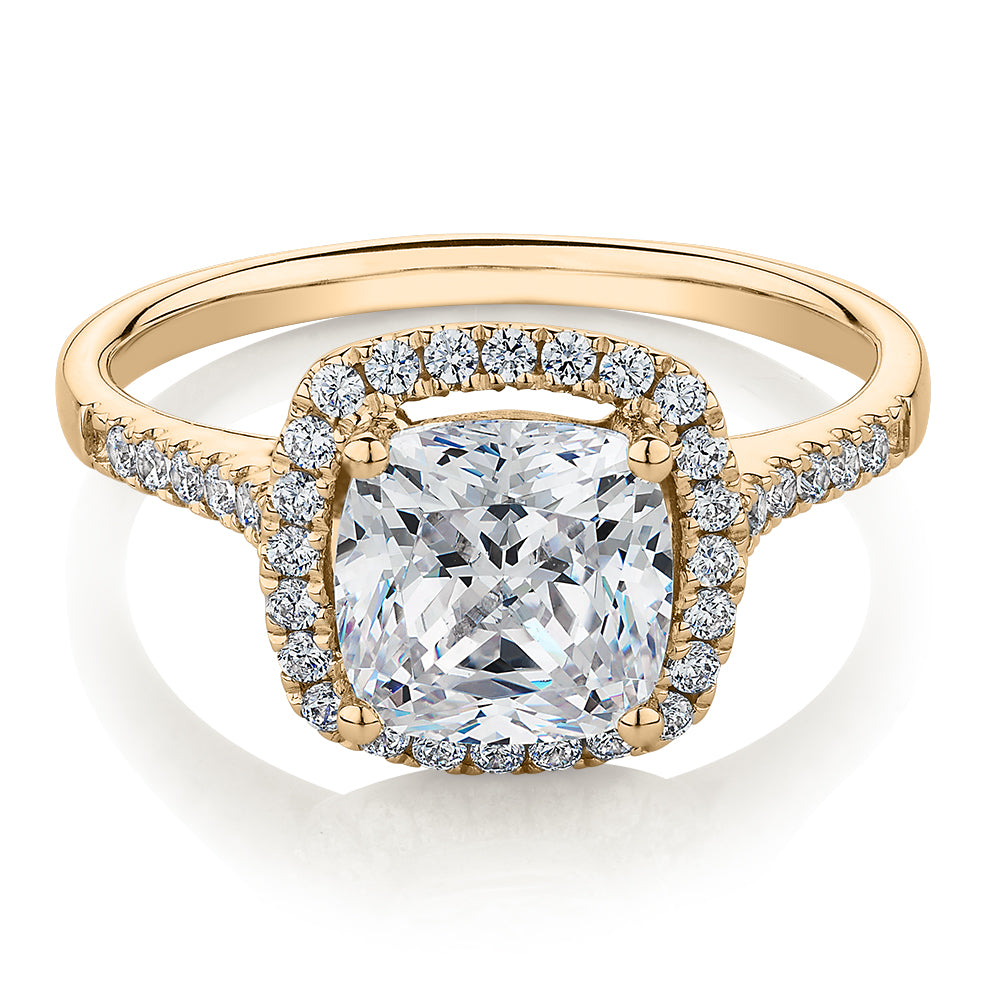 Cushion and Round Brilliant halo engagement ring with 1.91 carats* of diamond simulants in 14 carat yellow gold