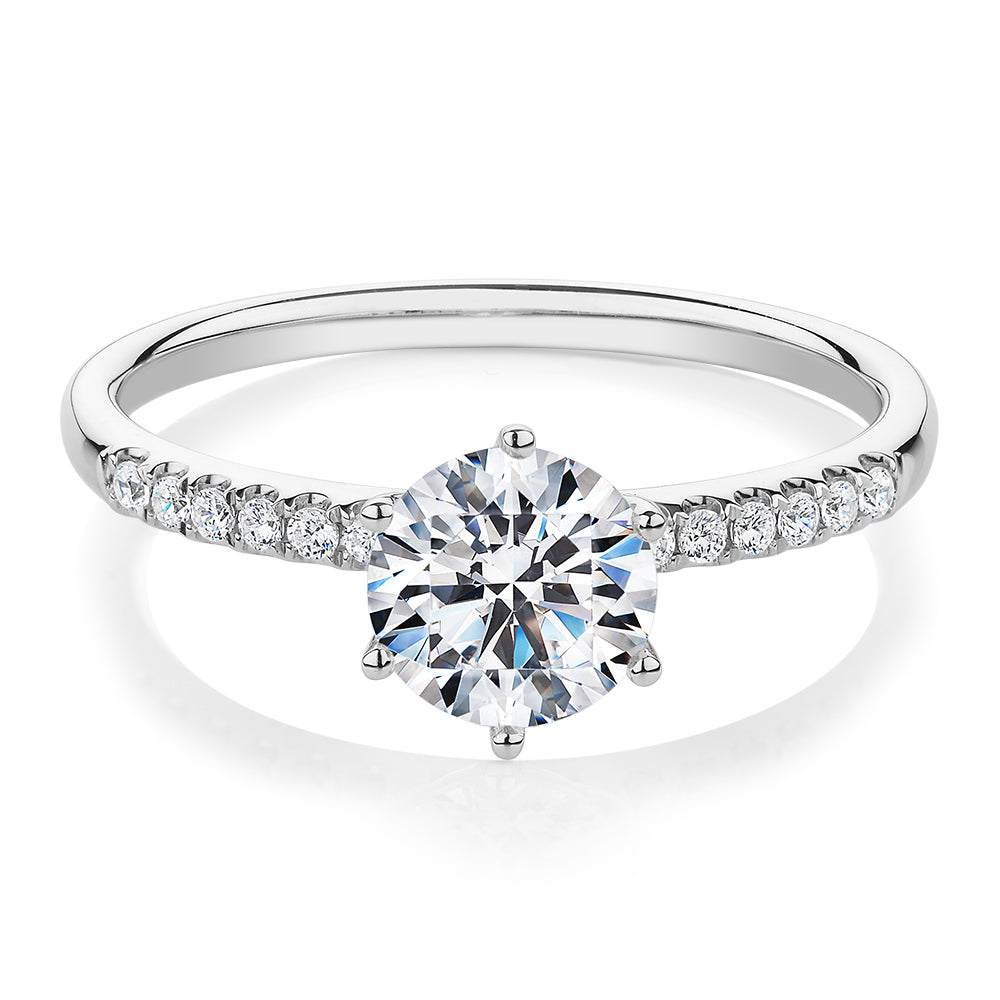 Round Brilliant shouldered engagement ring with 1.11 carats* of diamond simulants in 14 carat white gold