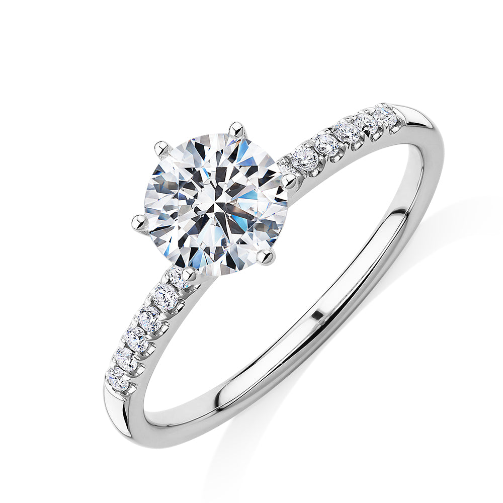 Round Brilliant shouldered engagement ring with 1.11 carats* of diamond simulants in 14 carat white gold