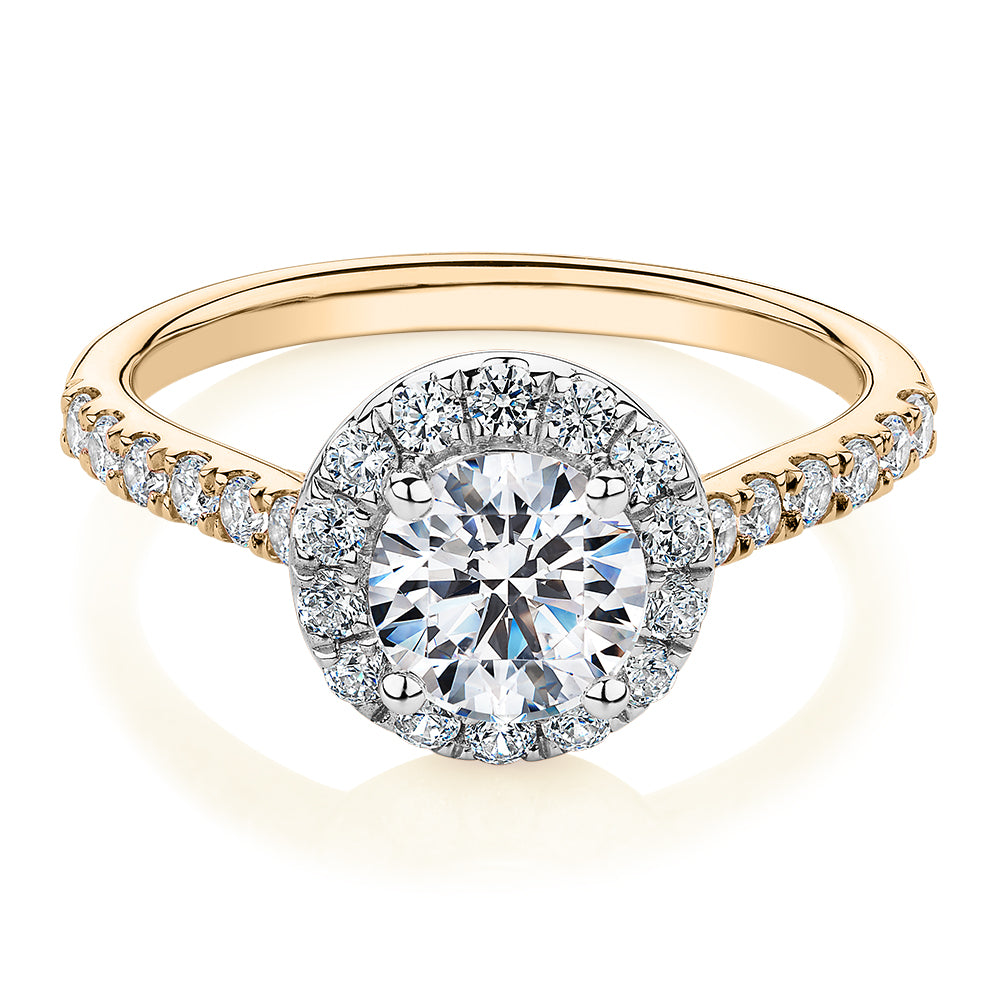 Round Brilliant halo engagement ring with 1.61 carats* of diamond simulants in 14 carat yellow and white gold