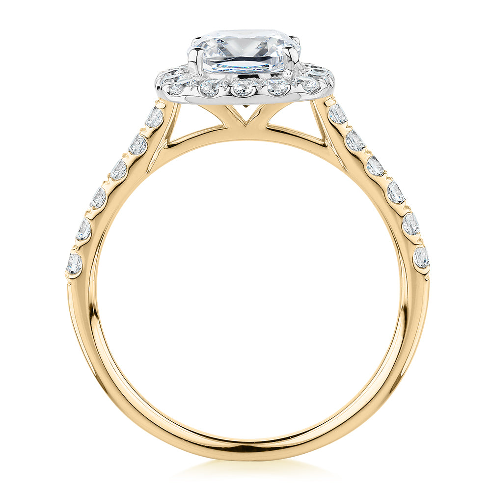 Cushion and Round Brilliant halo engagement ring with 1.65 carats* of diamond simulants in 14 carat yellow and white gold