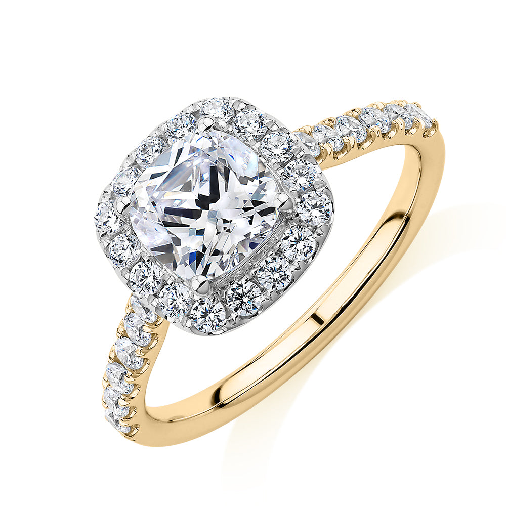 Cushion and Round Brilliant halo engagement ring with 1.65 carats* of diamond simulants in 14 carat yellow and white gold