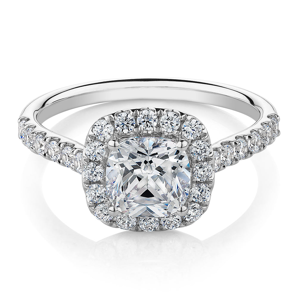 Cushion and Round Brilliant halo engagement ring with 1.65 carats* of diamond simulants in 14 carat white gold