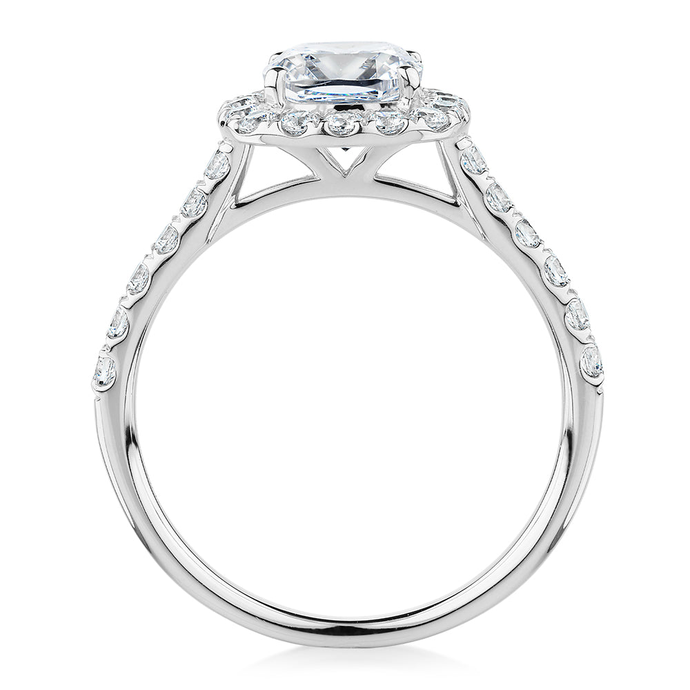 Cushion and Round Brilliant halo engagement ring with 1.65 carats* of diamond simulants in 14 carat white gold