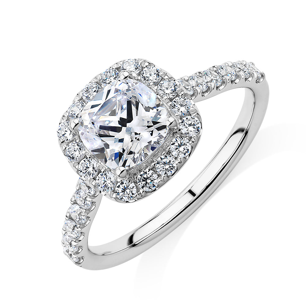 Cushion and Round Brilliant halo engagement ring with 1.65 carats* of diamond simulants in 14 carat white gold