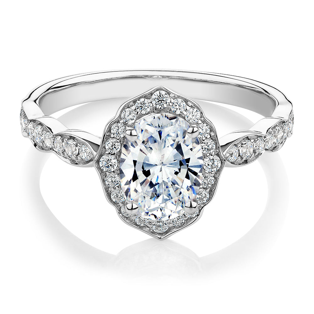 Oval halo engagement ring with 1.55 carats* of diamond simulants in 14 carat white gold