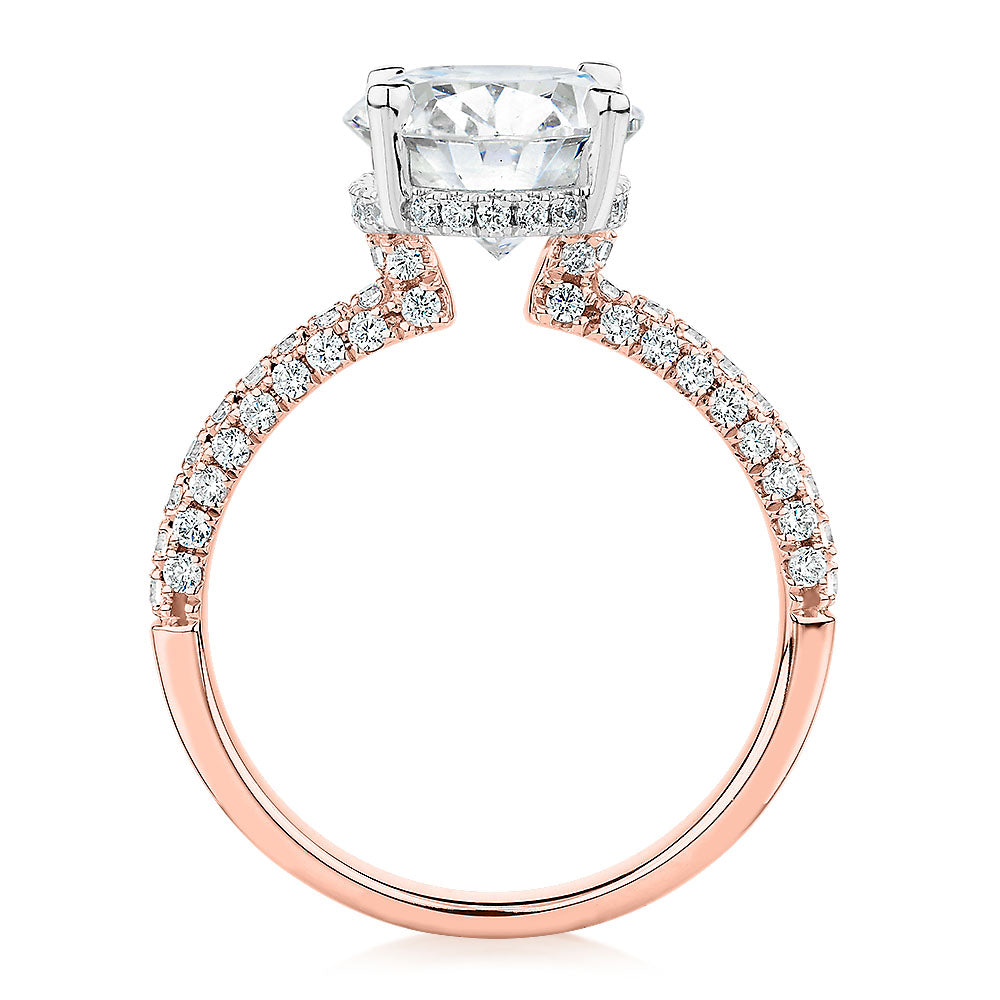 Oval and Round Brilliant shouldered engagement ring with 4.35 carats* of diamond simulants in 10 carat rose gold