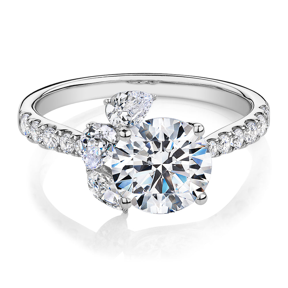 Round Brilliant and Marquise shouldered engagement ring with 2.78 carats* of diamond simulants in 14 carat white gold