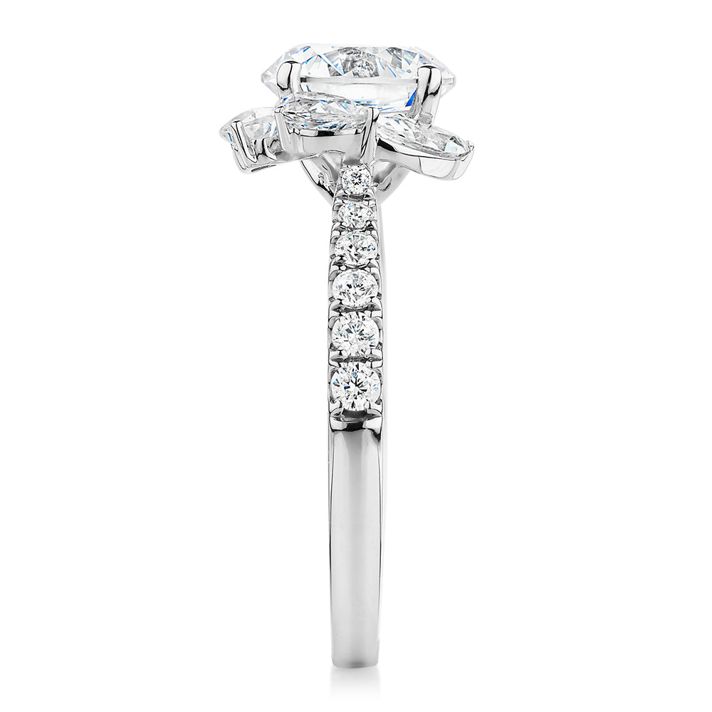 Round Brilliant and Marquise shouldered engagement ring with 2.78 carats* of diamond simulants in 14 carat white gold