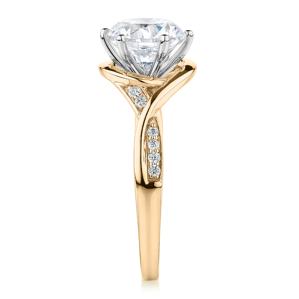 Round Brilliant shouldered engagement ring with 2.13 carats* of diamond simulants in 14 carat yellow and white gold