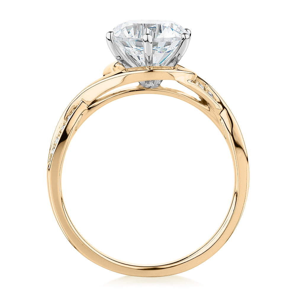 Round Brilliant shouldered engagement ring with 2.13 carats* of diamond simulants in 14 carat yellow and white gold