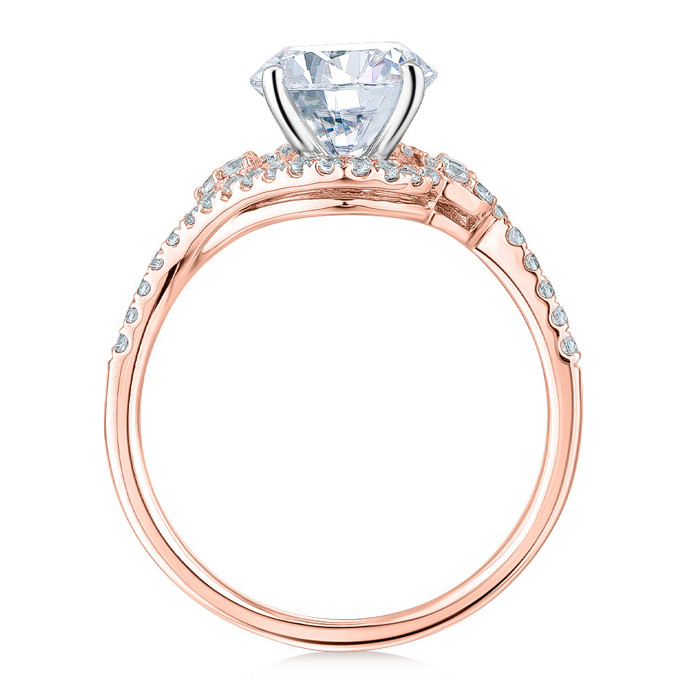 Round Brilliant shouldered engagement ring with 2.27 carats* of diamond simulants in 14 carat rose and white gold