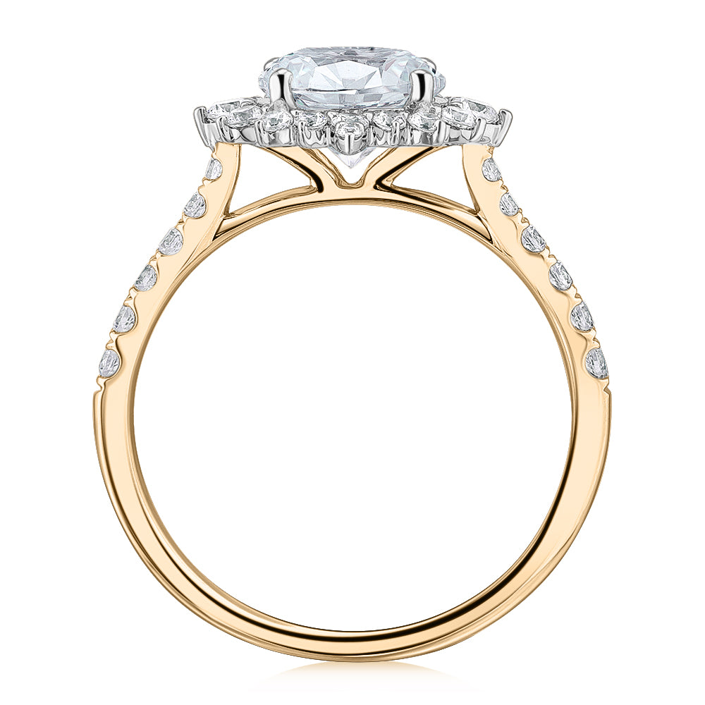 Round Brilliant shouldered engagement ring with 2.09 carats* of diamond simulants in 14 carat yellow and white gold