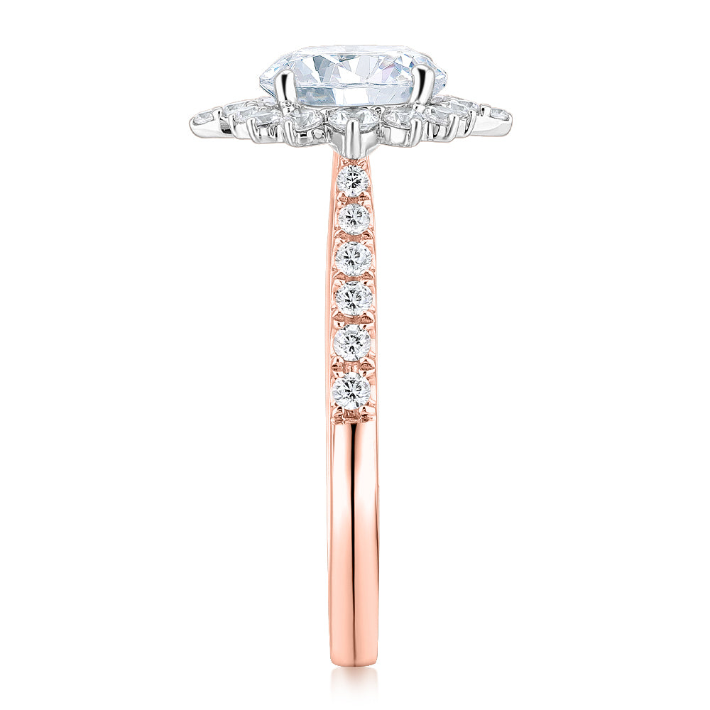 Round Brilliant shouldered engagement ring with 2.09 carats* of diamond simulants in 14 carat rose and white gold