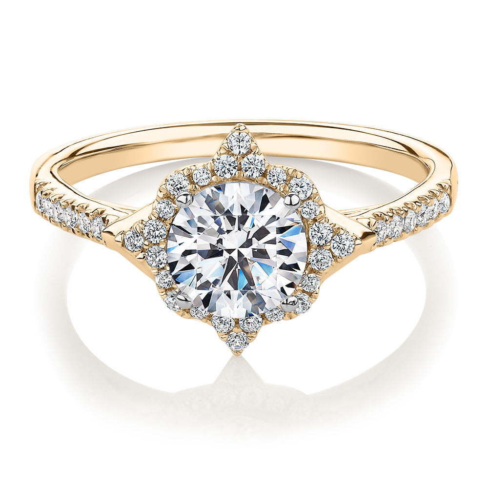 Round Brilliant halo engagement ring with 1.19 carats* of diamond simulants in 14 carat yellow and white gold