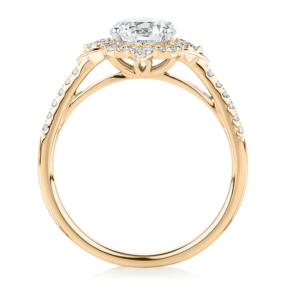 Round Brilliant halo engagement ring with 1.19 carats* of diamond simulants in 14 carat yellow and white gold