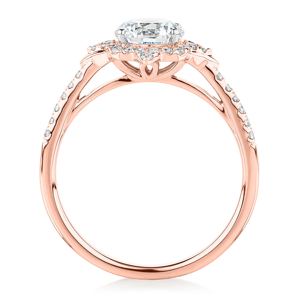 Round Brilliant halo engagement ring with 1.19 carats* of diamond simulants in 14 carat rose and white gold