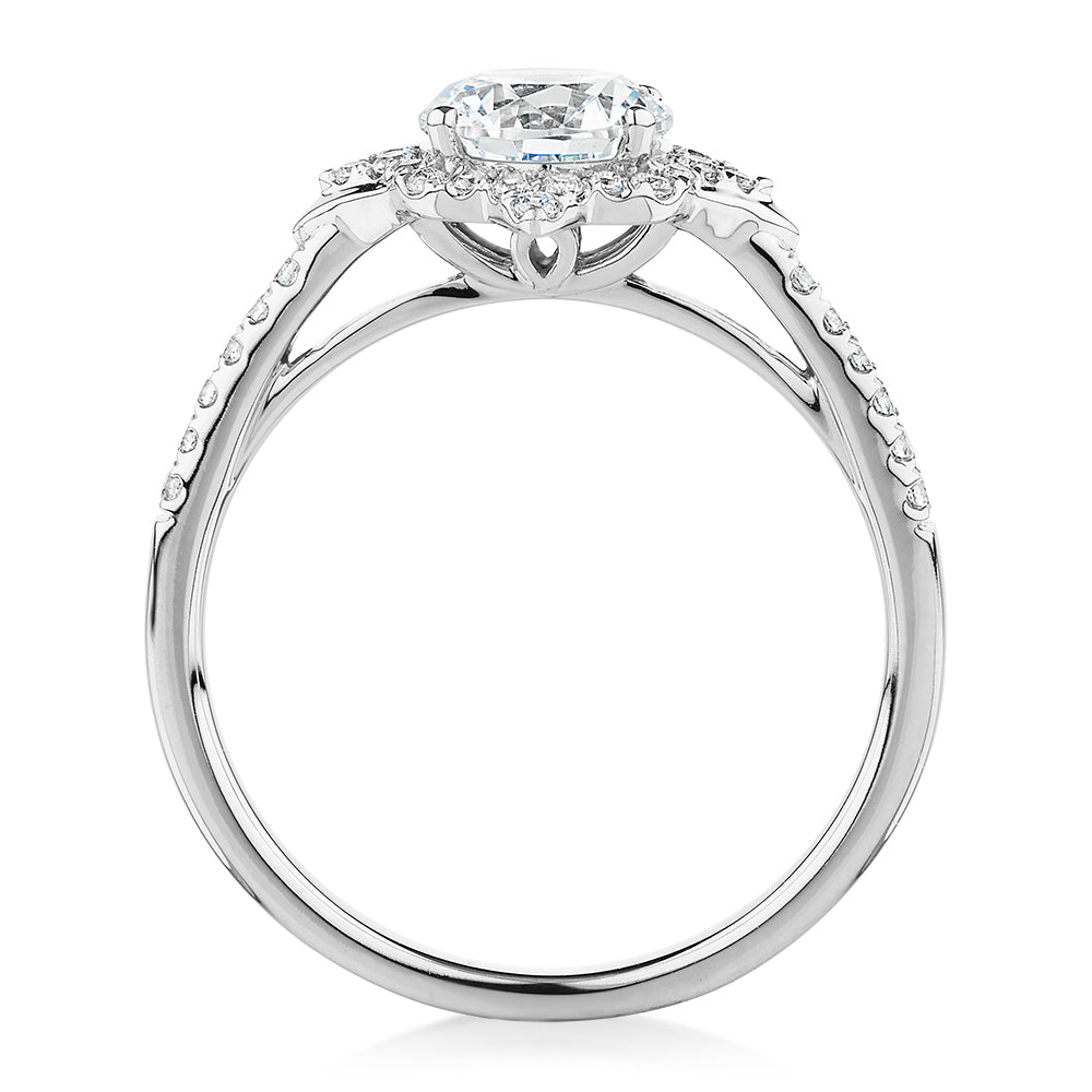 Round Brilliant halo engagement ring with 1.19 carats* of diamond simulants in 14 carat white gold