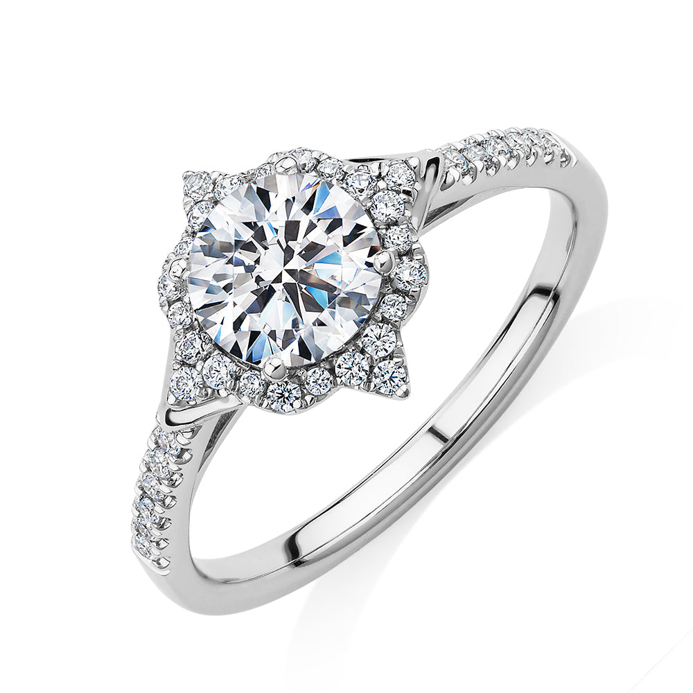Round Brilliant halo engagement ring with 1.19 carats* of diamond simulants in 14 carat white gold