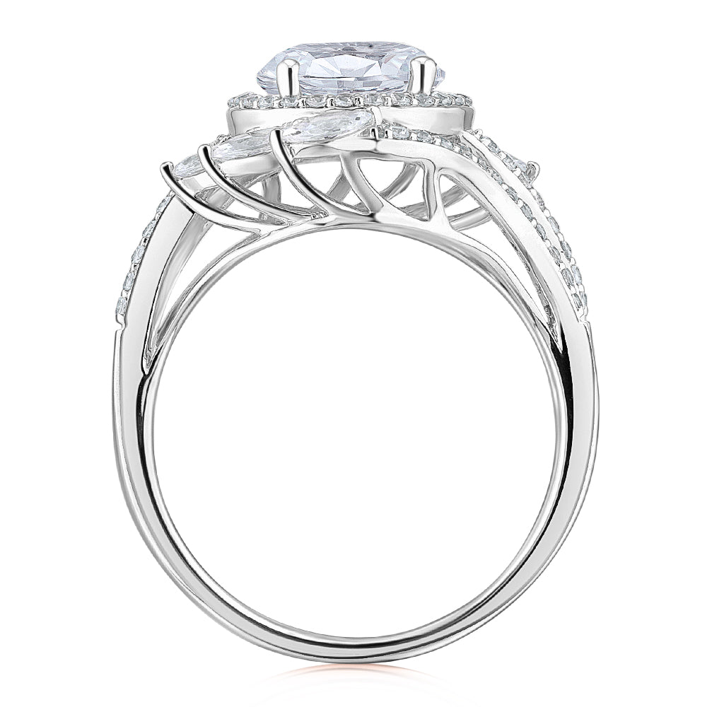 Round Brilliant halo engagement ring with 2.97 carats* of diamond simulants in 14 carat white gold