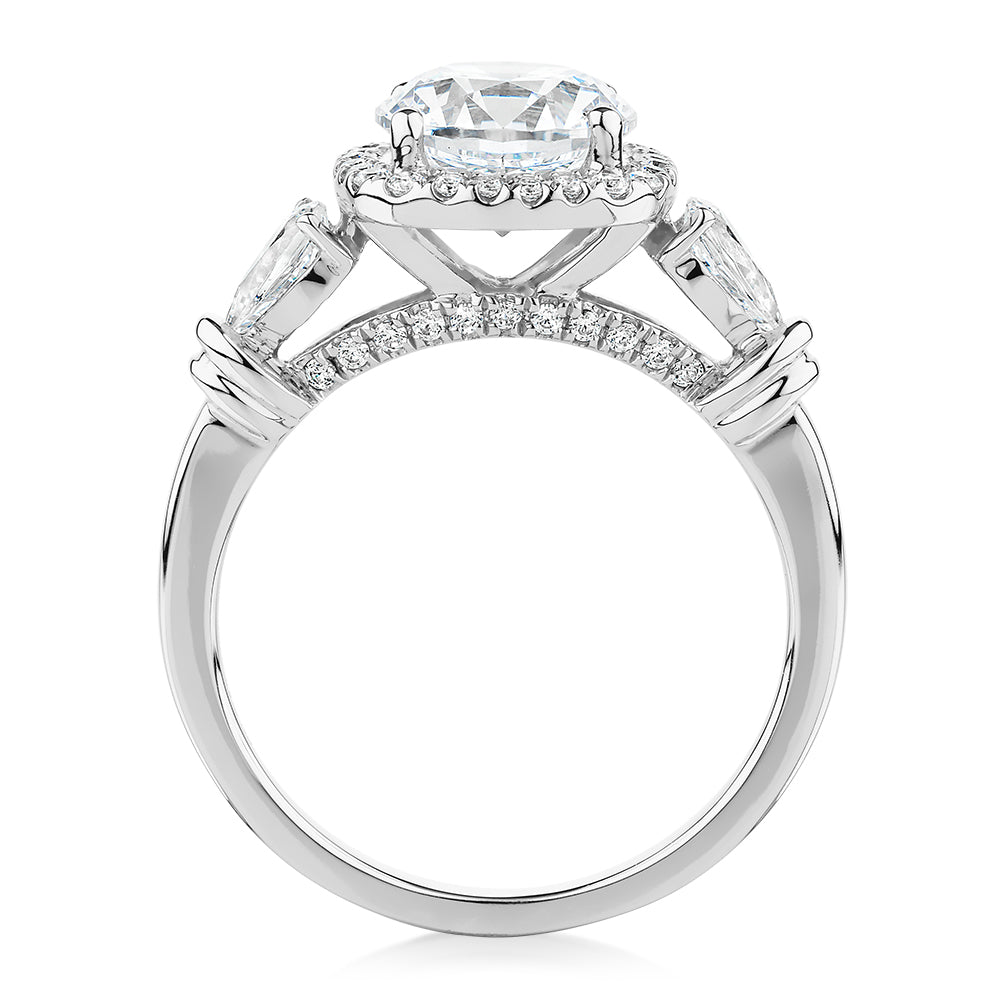 Round Brilliant halo engagement ring with 2.78 carats* of diamond simulants in 14 carat white gold