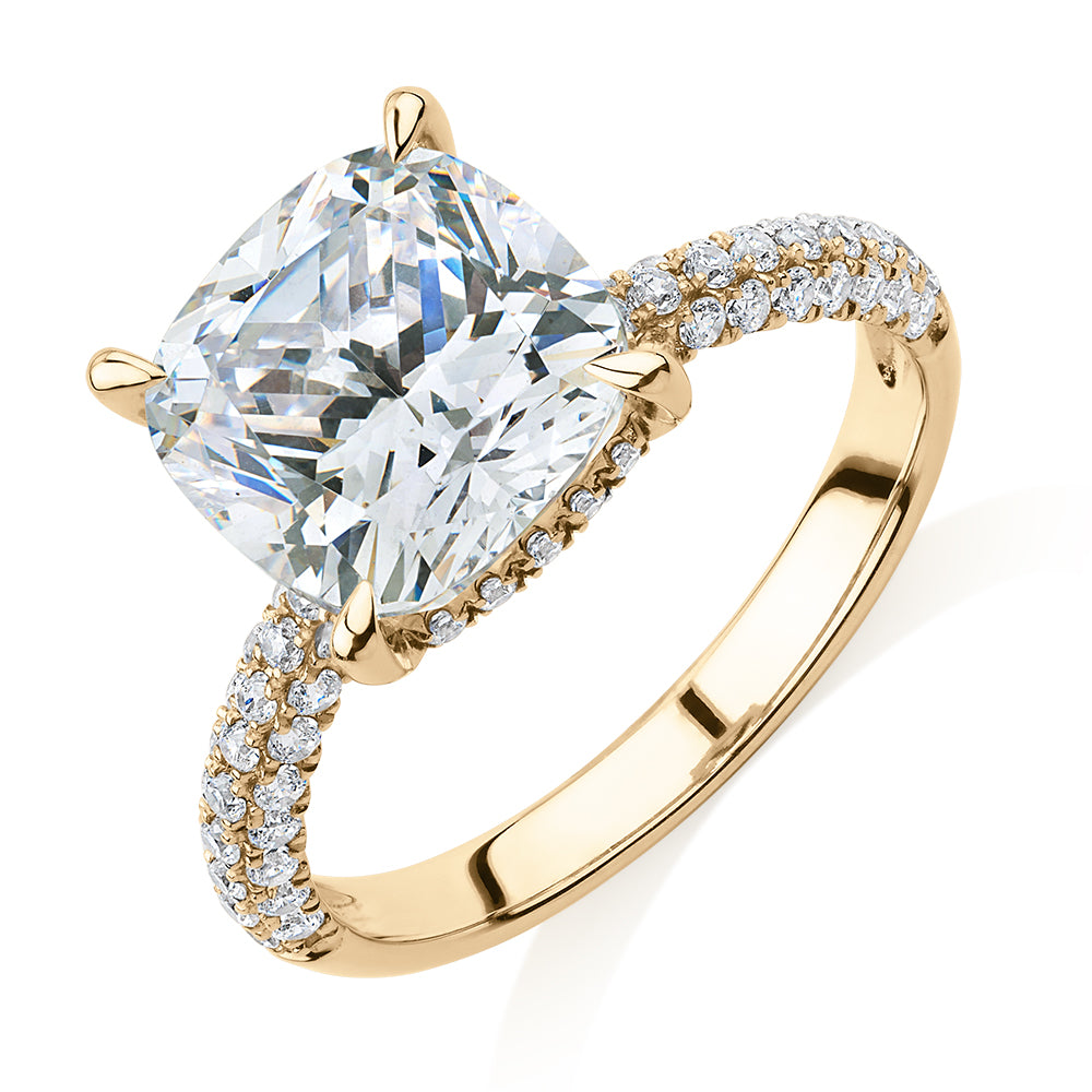 Cushion and Round Brilliant shouldered engagement ring with 3.84 carats* of diamond simulants in 10 carat yellow gold
