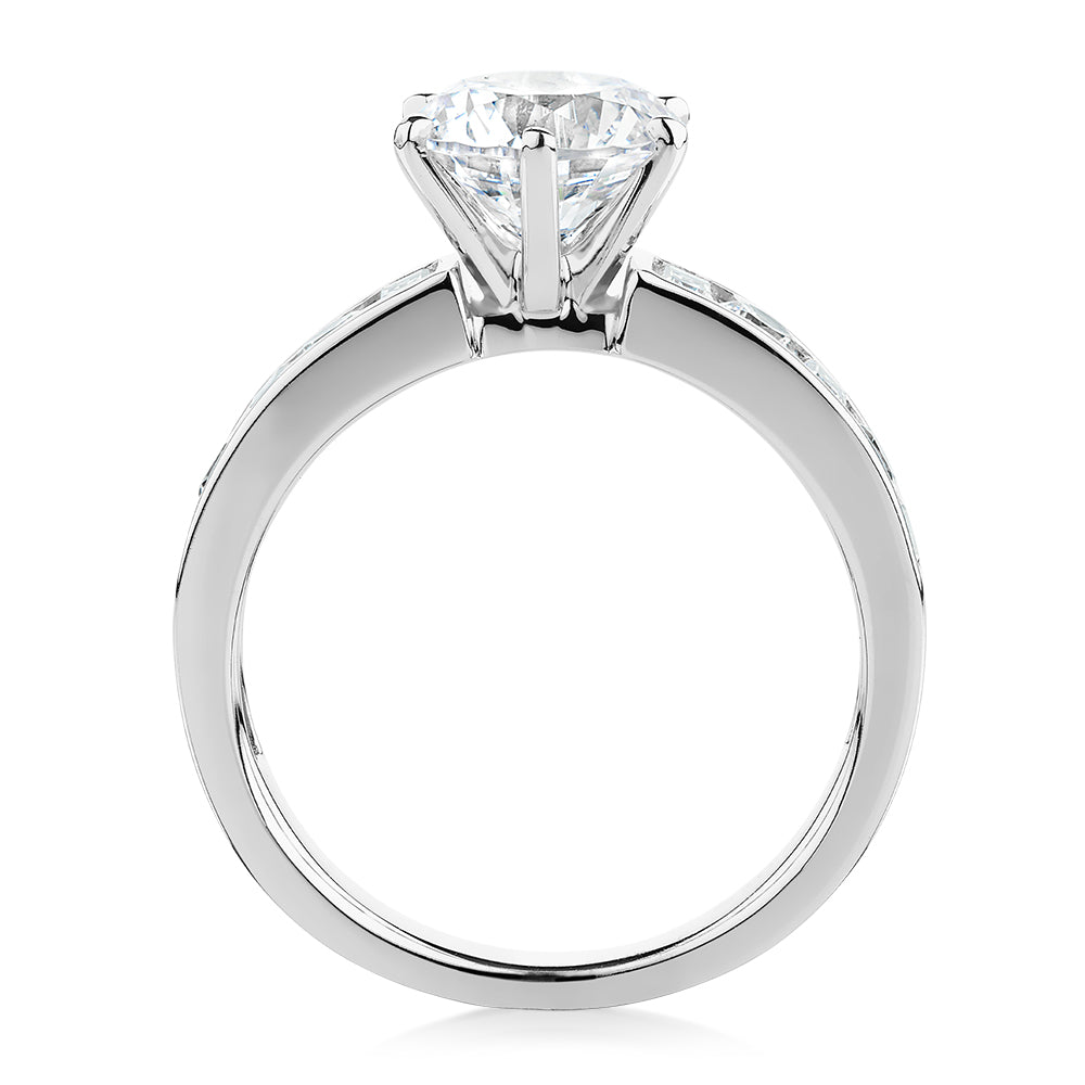 Round Brilliant and Baguette shouldered engagement ring with 2.72 carats* of diamond simulants in 14 carat white gold