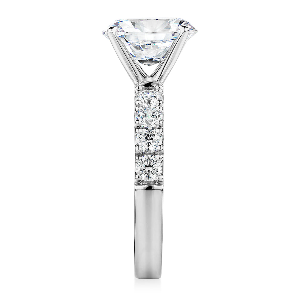 Oval shouldered engagement ring with 3.18 carats* of diamond simulants in 14 carat white gold