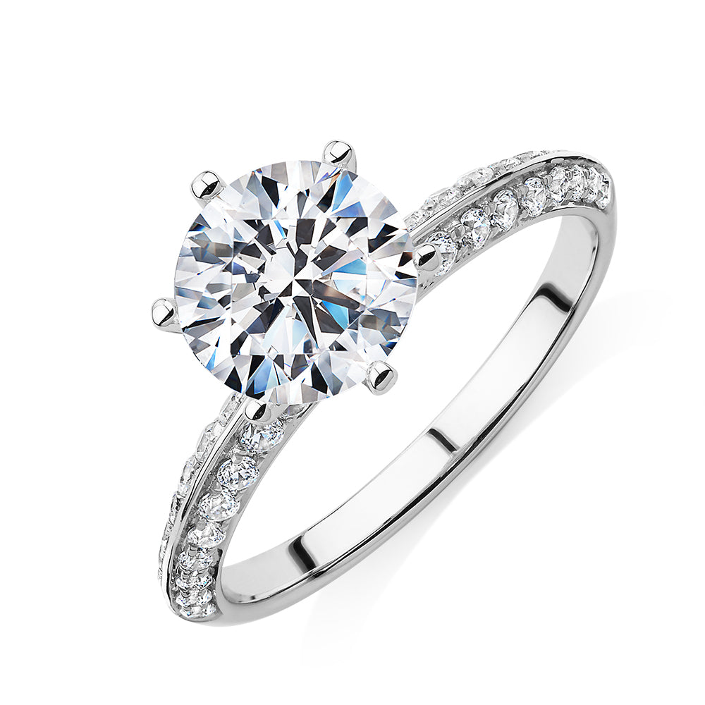 Round Brilliant shouldered engagement ring with 2.47 carats* of diamond simulants in 14 carat white gold