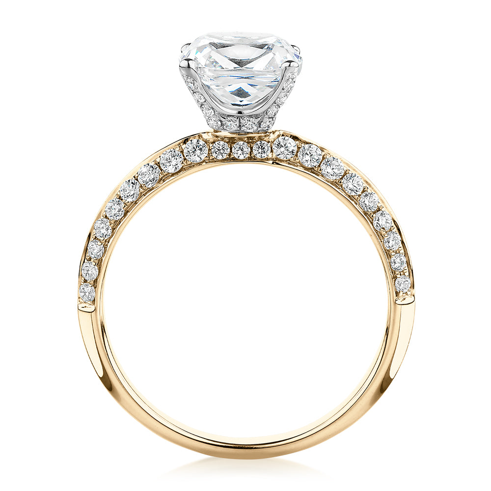 Cushion shouldered engagement ring with 2.08 carats* of diamond simulants in 14 carat yellow and white gold