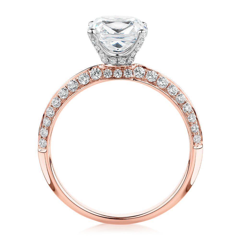 Cushion shouldered engagement ring with 2.08 carats* of diamond simulants in 14 carat rose and white gold