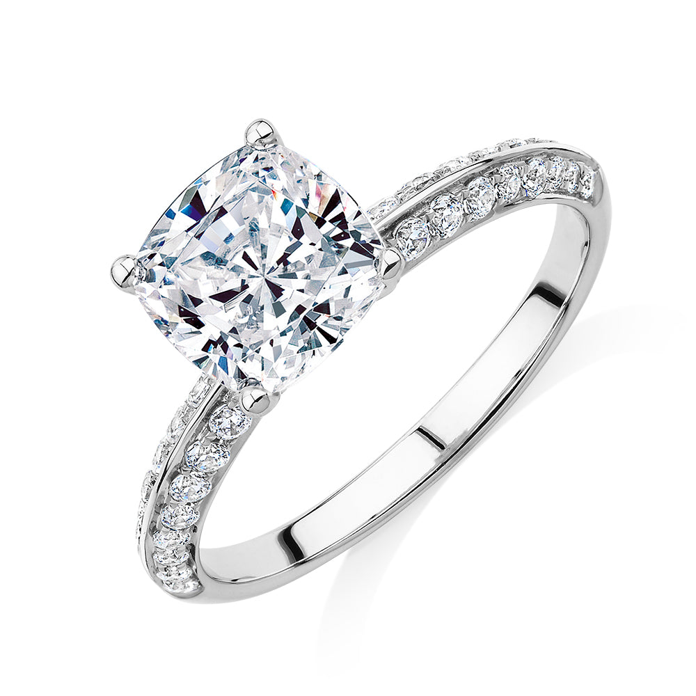 Cushion shouldered engagement ring with 2.08 carats* of diamond simulants in 14 carat white gold
