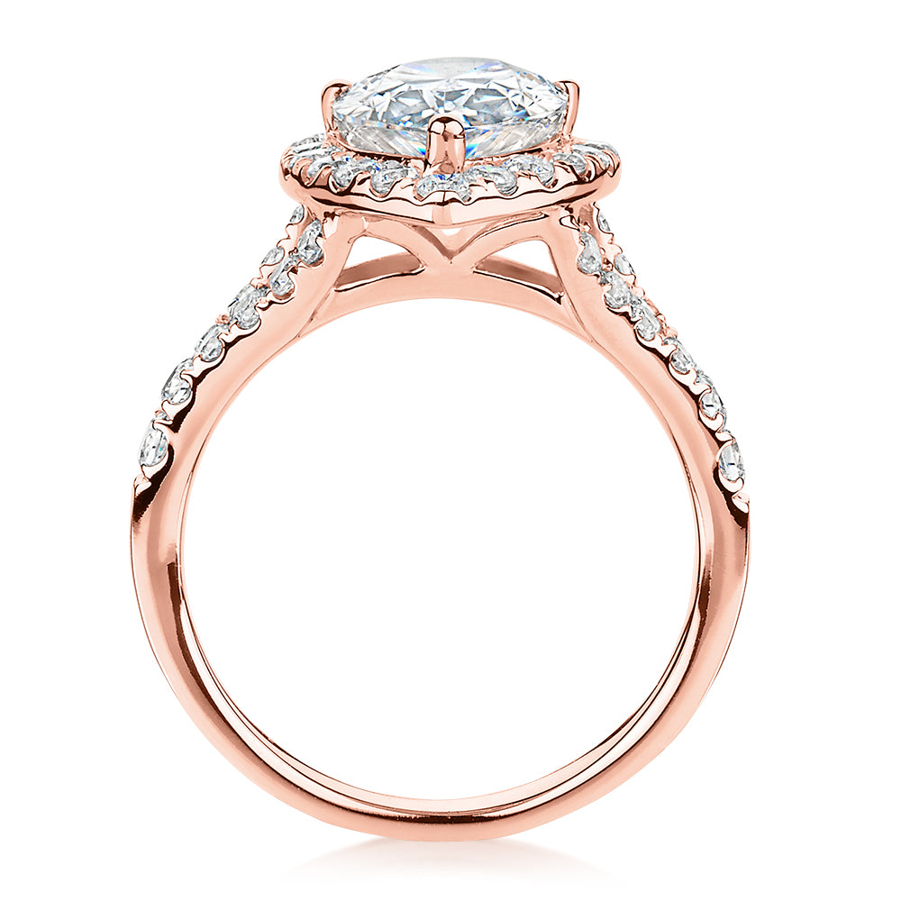Pear and Round Brilliant halo engagement ring with 3.81 carats* of diamond simulants in 10 carat rose gold
