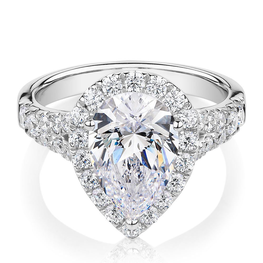 Pear and Round Brilliant halo engagement ring with 3.81 carats* of diamond simulants in 10 carat white gold