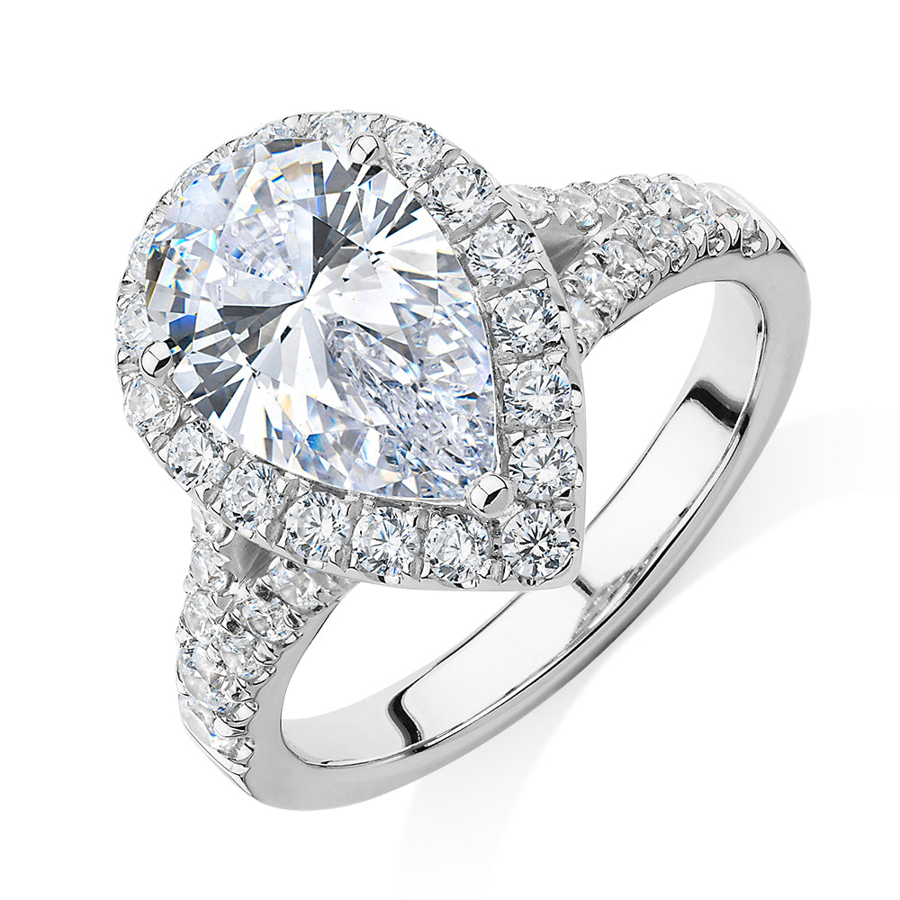 Pear and Round Brilliant halo engagement ring with 3.81 carats* of diamond simulants in 10 carat white gold