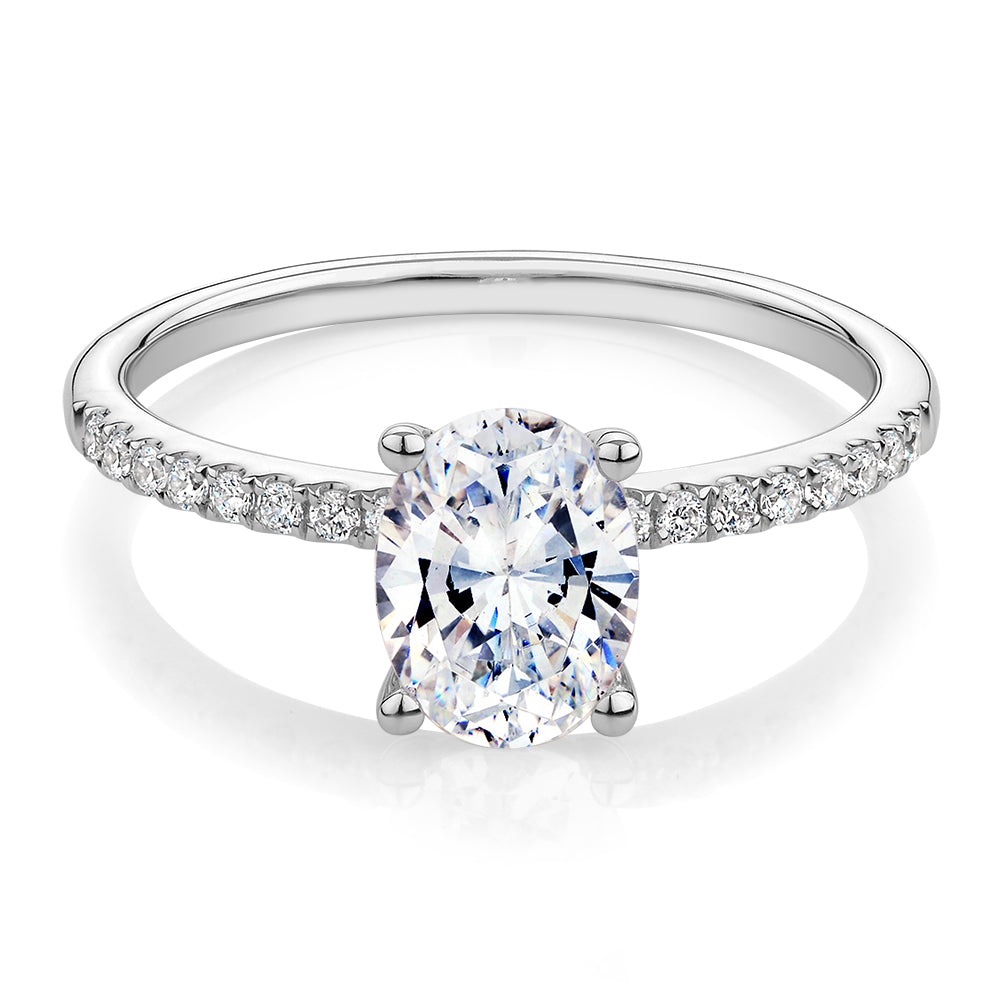 Oval and Round Brilliant shouldered engagement ring with 1.35 carats* of diamond simulants in 14 carat white gold